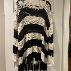 Perfectly oversized and breathable, Paula is great for beach to street